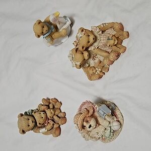 4 bear figurines